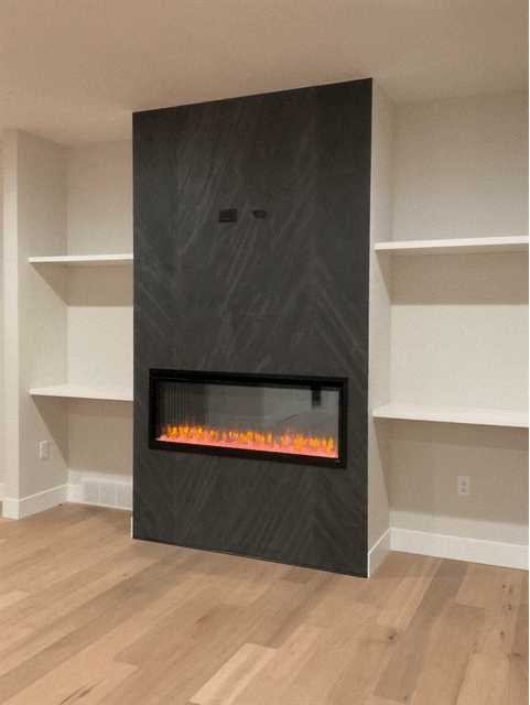 Fireplace with slate surround and shelving