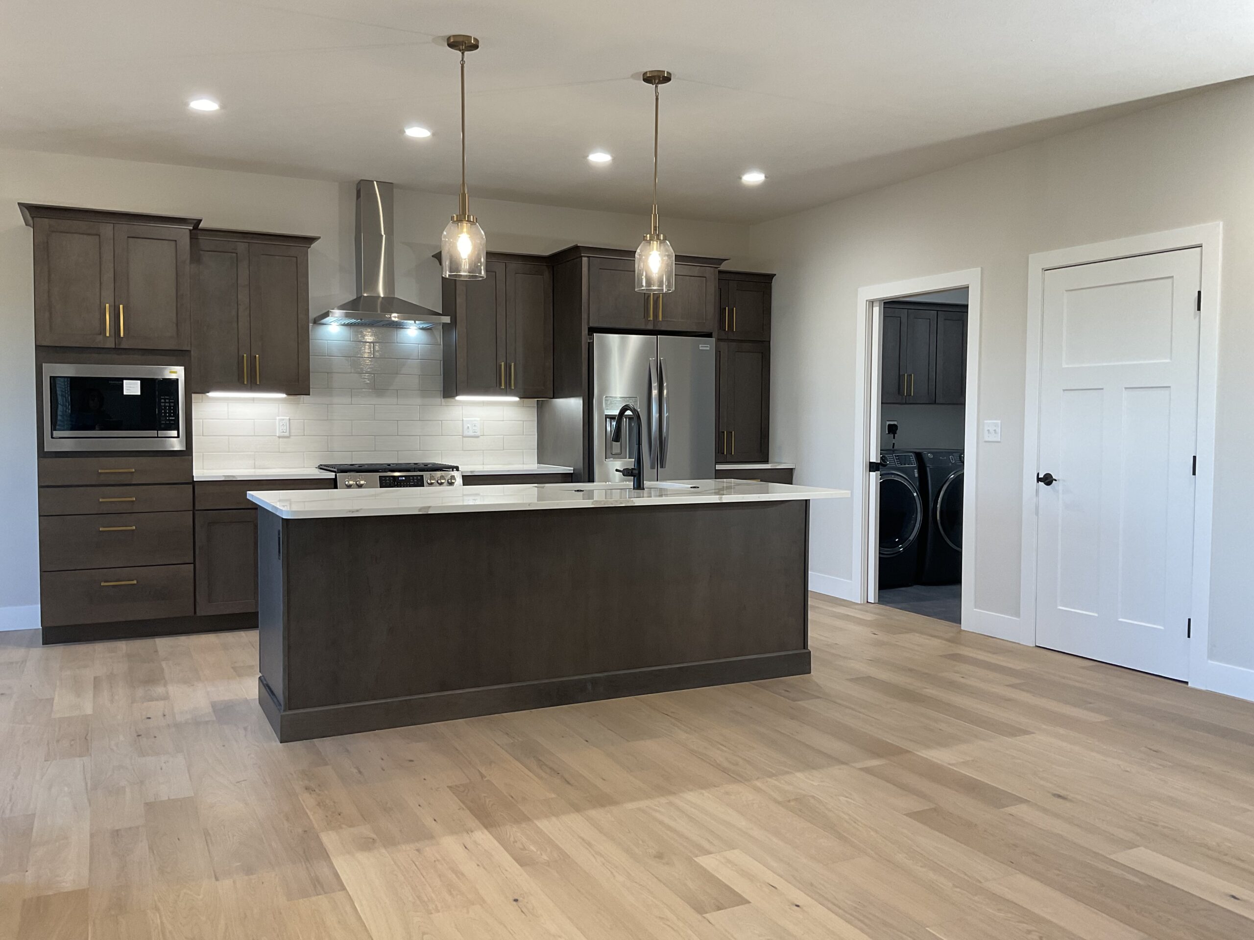 Spacious Kitchen with Pantry and Pocket Door to Laundry